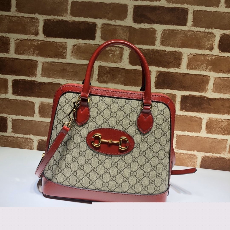 G*u*i top handle bags